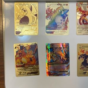 Charizard DX Gold Pokemon collectible card. It’s a gold pokemon card.